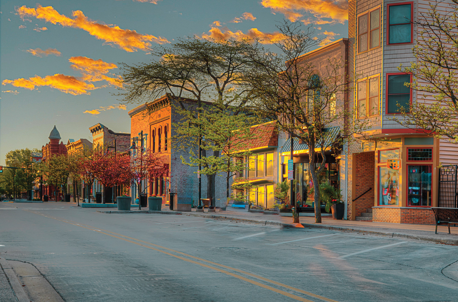 Buildings along a small downtown street at dusk